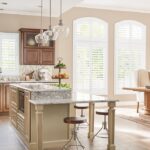 Graber composite shutters in arched kitchen windows