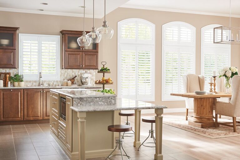 Graber composite shutters in arched kitchen windows