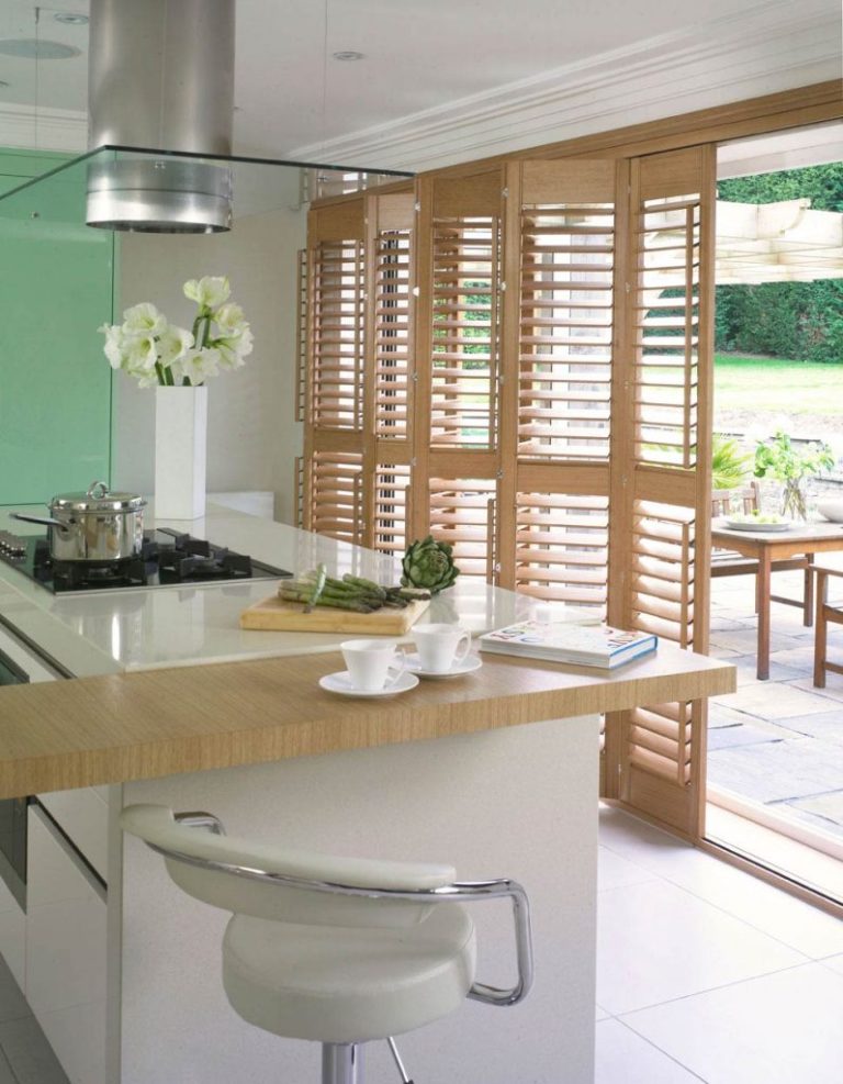 Norman tracked shutters in a kitchen area