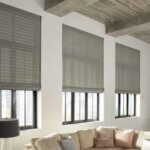 Graber Motorized Roman Shades in Tall Living Room Windows